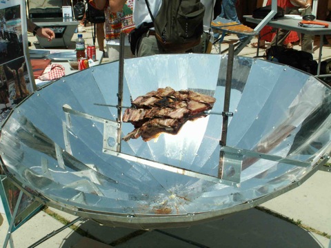 File:Grilling meat with parabolic solar cooker.jpg