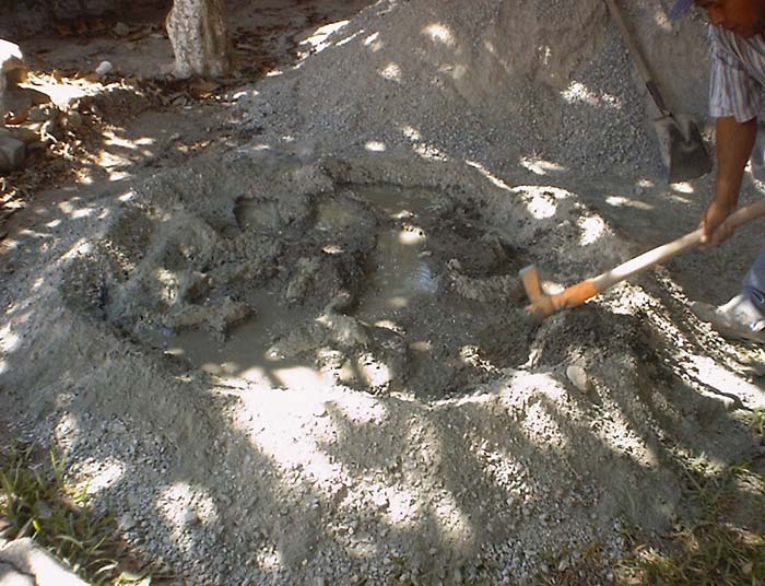 File:Mixing the cement.jpg