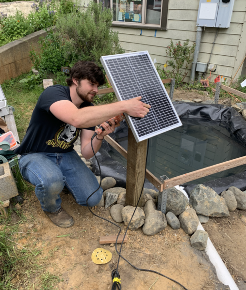 File:Installing the Solar Panel.png