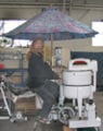 Bart Orlando demonstrates that one person has the power to wash clothes in a pedal powered Wringer washing machine. The wringer eliminates the spin dry function, standard on modern washing machines. One person can do 1/3 of a normal load of laundry in about 30 minutes.
