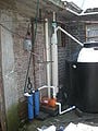 1.a First rain enters 140 L first flush the following rain goes into the cistern then when needed it is pumped through the filters and to the roof top tank for water pressure