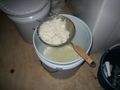 Strained curds can then be transferred to cheesecloth