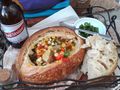 corn chowder in a sourdough bread bowl along with a Red Stripe. One of Robin Elizabeth's favorite things to relax with on a summer afternoon.