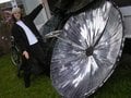 And old satellite dish becomes a solar cooker.
