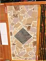 Old tile broken up, attached with Mastick and grouted together