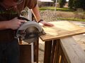 Fig.4-Cutting a 3/4 inch plywood to make a platform for the reservoir to sit on.