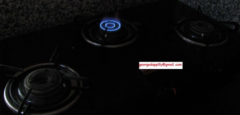 File:Gas stove lighted.JPG
