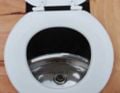 Composting ToiletDuchamp de Loo, is a composting toilet system that can be used and can educate people about environmental ways to get rid of human waste