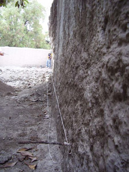 File:Using the wall to measure.jpg