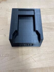 A top view of the battery shoe with the Makerspace room number