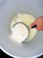 Scoop curds out with strainer or slotted spoon