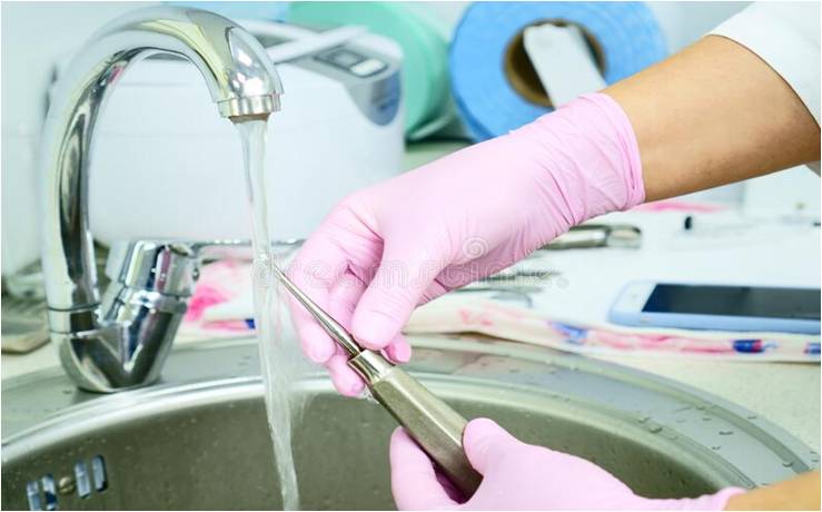 File:Cleaning Surgical Instruments with Water.jpg
