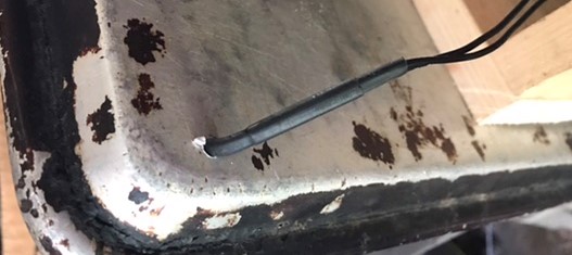 File:Hole in sheet pan for wiring.jpeg