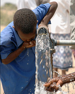 File:US Navy 080208-F-7577K-046 A child drinks water from a well built by Naval Mobile Construction Battalion (NMCB) 40 in Shant Abak.jpg