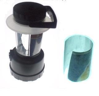 File:Camping lamp with PET bottle chipsbag reflector .jpg