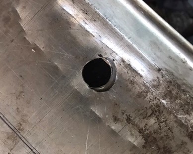File:Detail of hole through 2 pans.jpeg