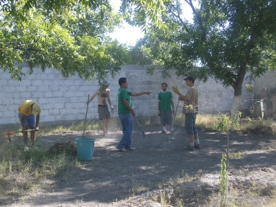 File:Clearing weeds and leveling ground -2.jpg