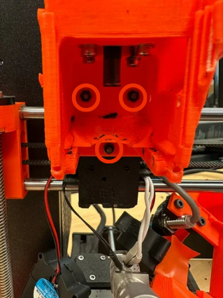 Front view of the adapter mounted to the original MK3S back plate fastened with nuts on the inside.