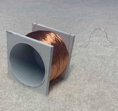 3D print the motor base, paint white, and wrap with copper wire