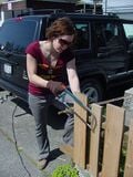 Here I am sawing the bamboo to fit into the canvas.
