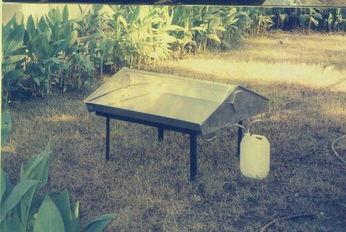 File:Solar Still Distilled Water.jpg