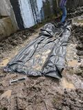 Laying down the erosion mat