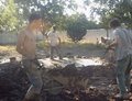 Fig: After the pile of dry dirt is made into a crater it needs to be filled with water and soaked over night so that the hard chunks of dirt will be easyer to break up and so that most of the dirt becomes wet and ready to be made into adobe.