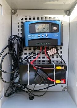 Fig 9. Placing the battery and charge controller inside the junction box