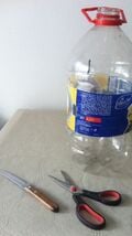 To make a pot out of a bottle, you'll need a bottle, a knife, a pair of scissors and a screwdriver.