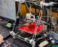 Environmental impacts of distributed manufacturing with 3-D printing
