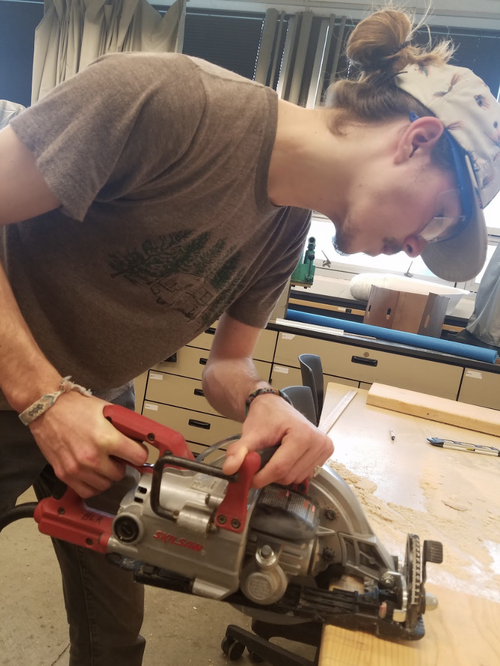 File:TeamEnterprise sawing .png