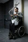 Field Ready's Wheelchair Hoist being used