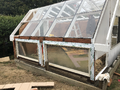 Sealing the front windows after replacing the rotten wood that was supporting them