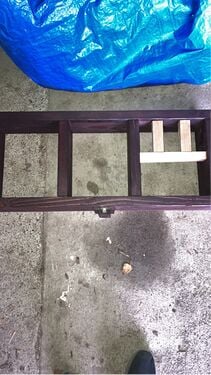 Frame pictured with unfinished ferrofluid brace blocks.