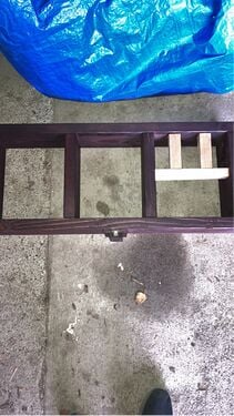 Frame pictured with unfinished ferrofluid brace blocks.