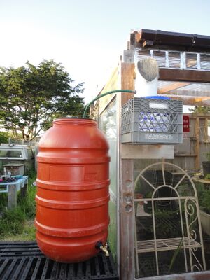 Finished small greenhouse rainwater catchment project.jpg