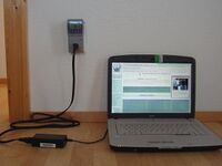 Figure 4. A laptop computer is plugged into the KillAWatt meter. (Photo by B. Sanders)