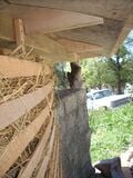 The clay is then stuffed into the wood lath frame and ends up drying and looking like this ready to plaster.