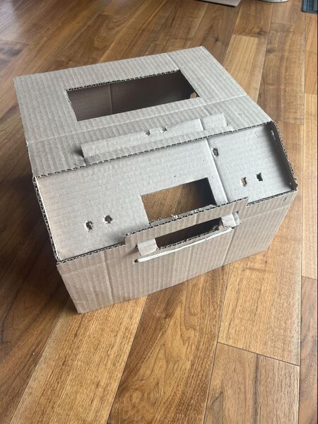 File:TissueDB-Sim-Laparoscopic-Box-Simulator-Build-09-Part-E-Side-Tabs-into-Part-A-Slits.jpg
