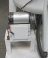 This version of the pedal powered washing machine features the addition of a pedal powered permanent magnet electric generator that can supply electricity to a 110v blender. The female end of an AC extension cord is wired to the positive and negative leads from the DC generator. The generator output is approximatley 110 volts-DC at 1100 rpm, while pedaling at about 90 rpm. Most household blenders have universal motors that run both AC or DC.