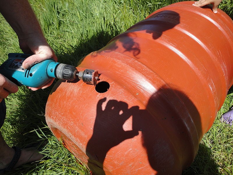 File:Drilling out a hole for spigot mounting hardware.JPG