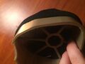 Fit a sock or another piece of spare fabric over the top of the mask. You can do this on the inside or the outside.