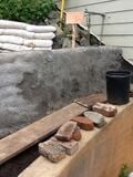 Fig 9: Woolcrete plastering in progress on 2 of the terraces.
