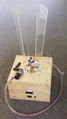 Bubble BoxConverts kinetic energy into electricity using a hand crank for means of education