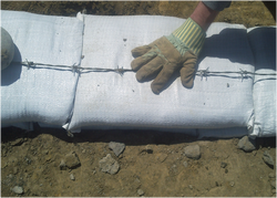 Figure 7 Laying the Bags (Photo courtesy of B. Reilly)
