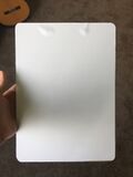 Reverse of clipboard writing surface.