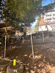 Prototyping for size using poles and string at approximate location of shed foundation