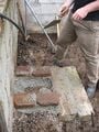 Concrete and recycled brick is used to build the sides.