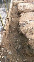 Rear trench dug to desired depth.