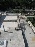 Fig 1: Taking measurements on the far rooftop.